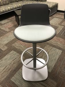 White and Black modern office chair with footrests delivered by Marathon Building Environments
