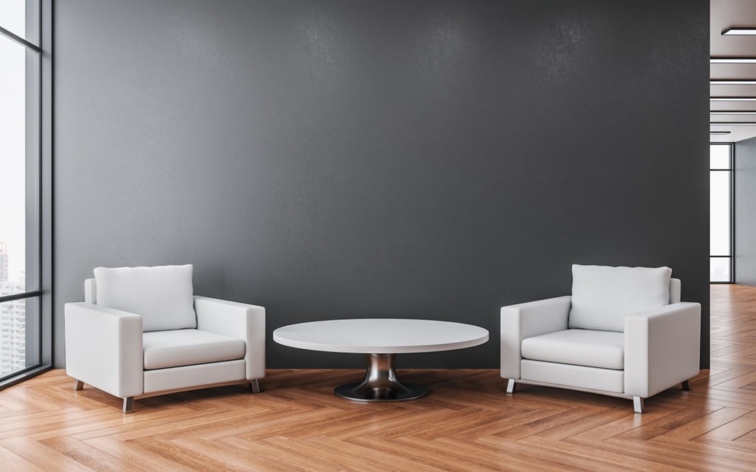 view of two white chairs with a round table in the middle displaying the latest healthcare furniture trends