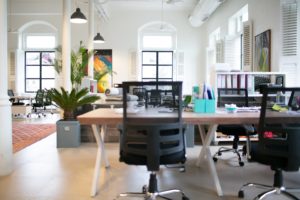 view of an office with ergonomic office chairs at the desks