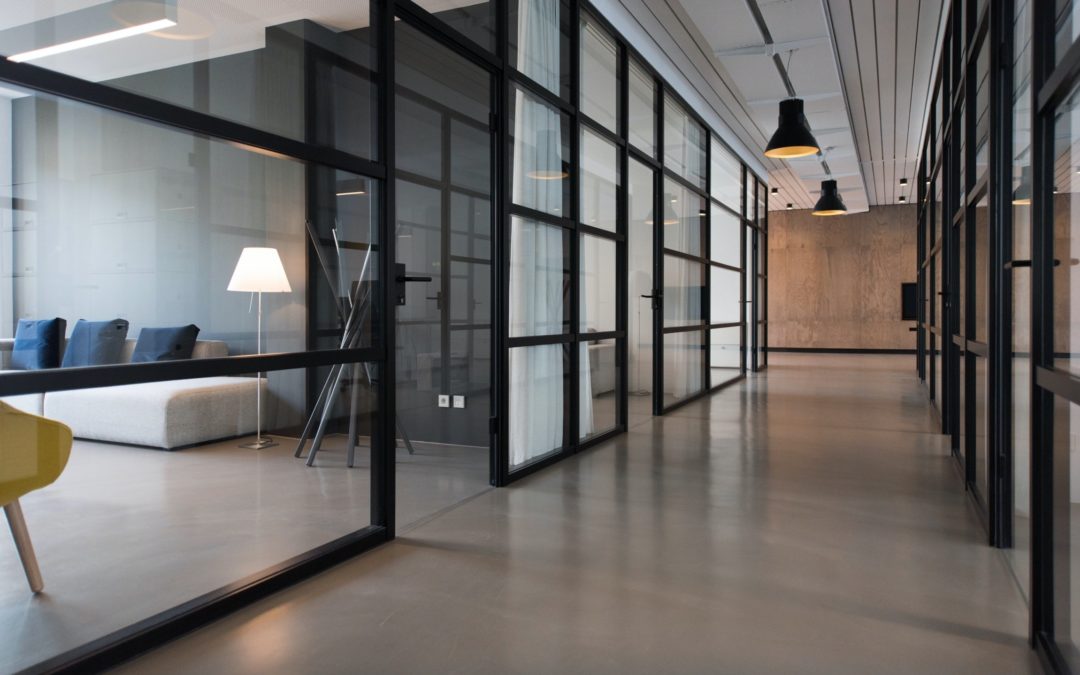 view of modern office hallway showing what is the best commercial flooring