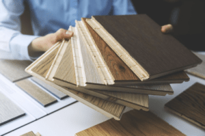 wood flooring selections on a table showing how to choose the right hardwood floor