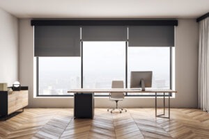 Modern wooden office interior with furniture and city view with window blinds over windows