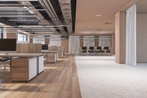 Spacious hardwood and tile coworking office interior with windows and city view, wooden parquet flooring, furniture and equipment.