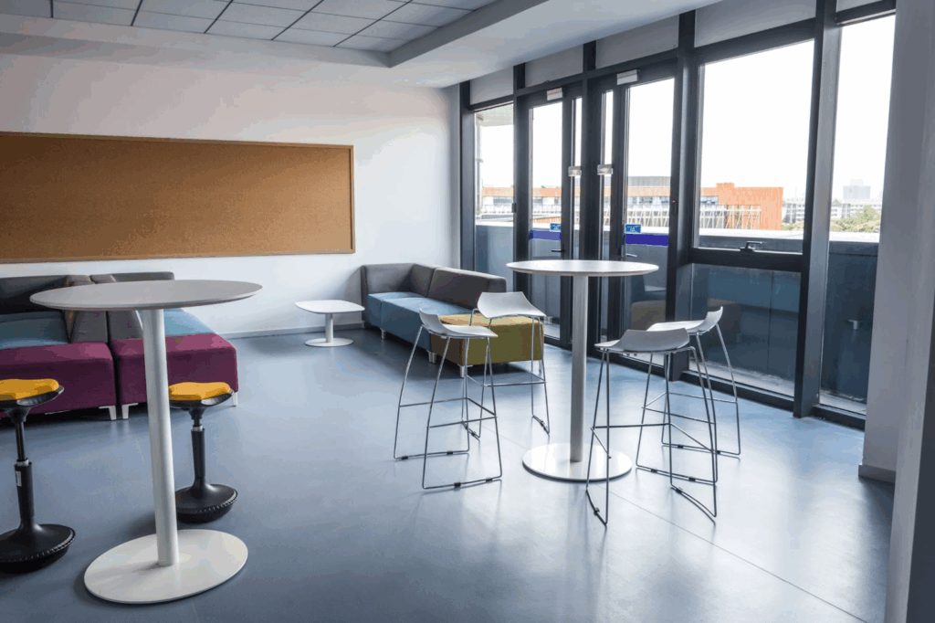 comfortable breakroom furniture, large windows, natural light