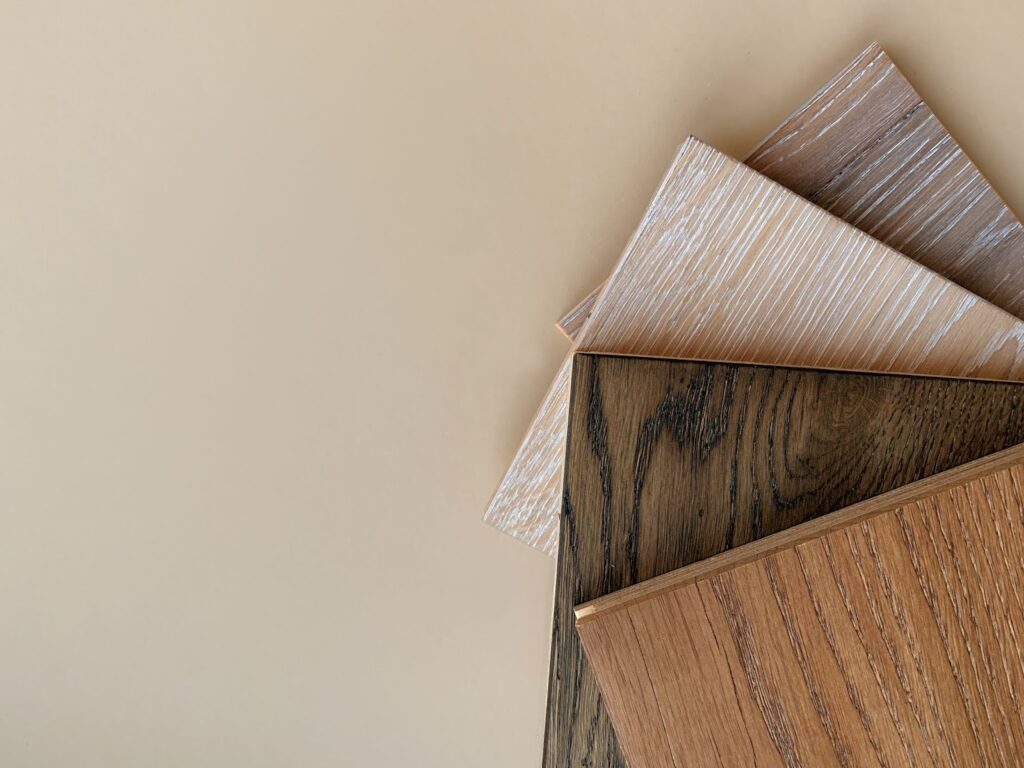 samples of flooring on a tan background
