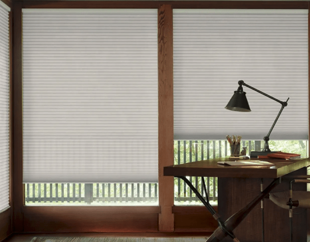 Hunter Douglas Duette Shades on the windows of an in home office