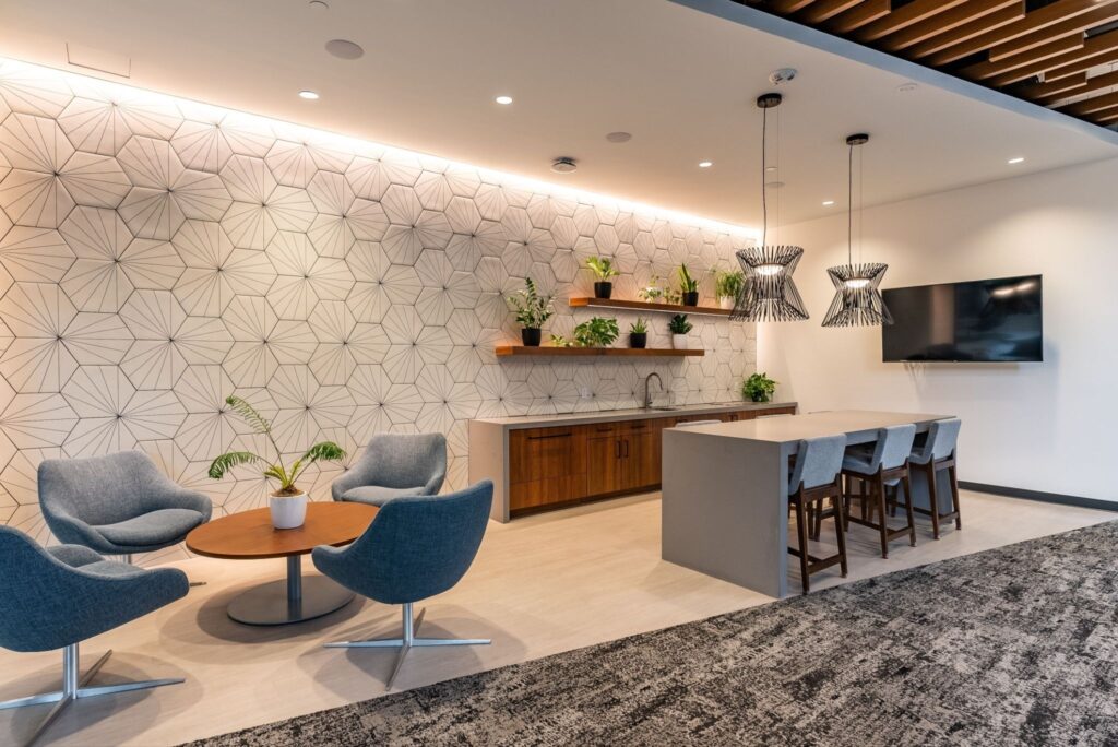 office break room with both carpet and hardwood for floor noise reduction